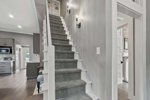 Access to the open loft via foyer stairs.