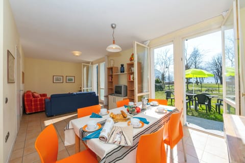 Spacious living room with open plan kitchen