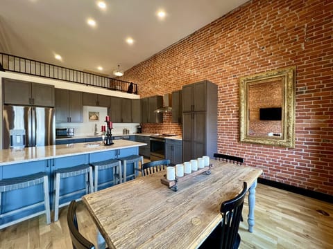 Dining room table for 4 with view into the kitchen
