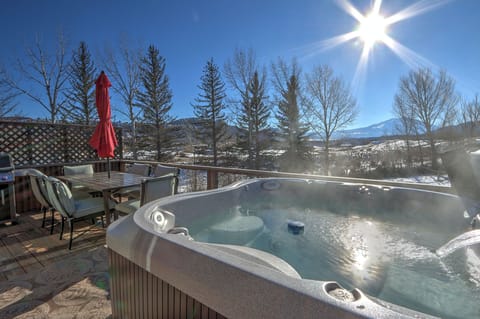 Unwind in our spacious hot tub after your adventures