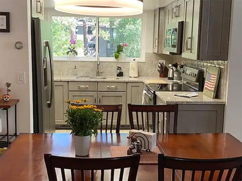 Fully equipped kitchen has contemporary cabinets and the chef's every wish.