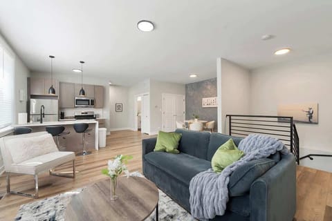 Relax in this bright and modern open-concept space, featuring a cozy living area, fully equipped kitchen, and a stylish dining nook. Designed for comfort and convenience—perfect for unwinding, cooking, and enjoying your stay