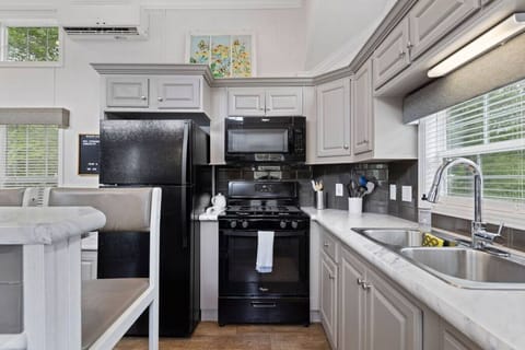 Full size oven and refrigerator.