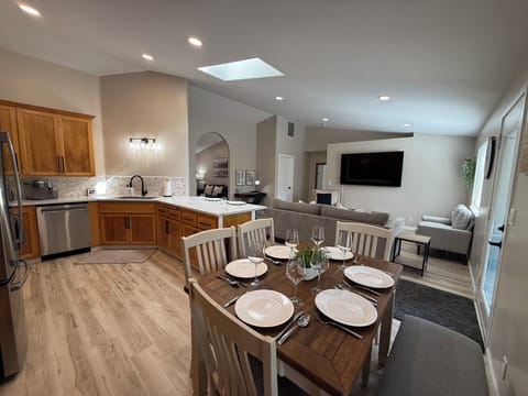 Eat in style at this cozy table for 6 with 3 additional bar seats.  