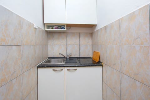 Fridge, microwave, cookware/dishes/utensils