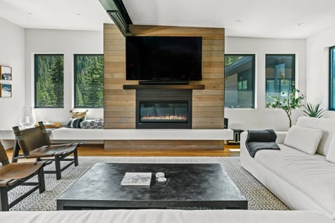 Comfort meets design: sleek furniture, clean lines, and cozy accents.