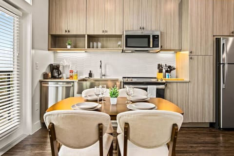 As you take your seat, the dining room's sophisticated design sets the stage for memorable meals and conversations.