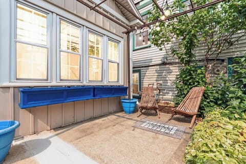 Have a seat and hang out on our beautiful, private front yard with bistro lights.