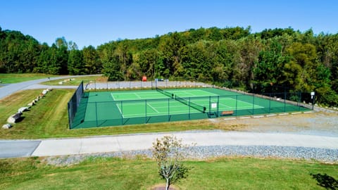 Enjoy access to community swimming pool, tennis courts, pickle ball, beach, and playground.