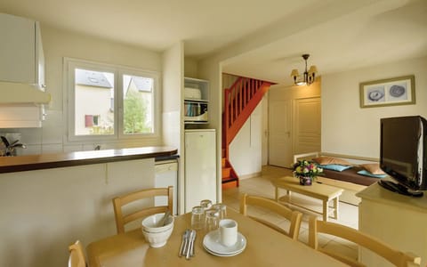 Loads of room at the dining table and the open concept is always nice for the cook.