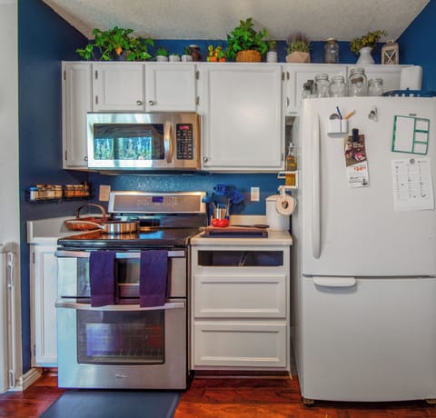 Fridge, oven, stovetop, dining tables