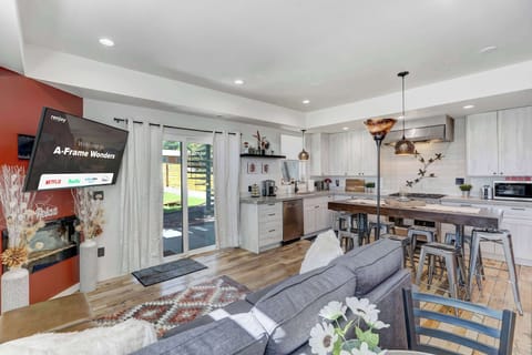 Unwind in this bright and stylish living area, where modern comforts meet cozy charm.