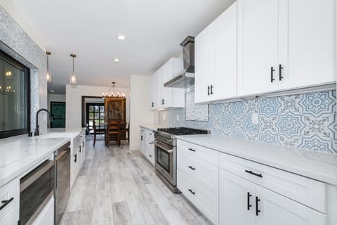 Full kitchen equipped with basic and high end appliances; dishwasher, microwave, oven, stovetop, refrigerator