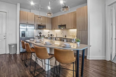 The dining room is bathed in natural light, creating a bright and inviting space where every meal feels special.