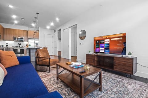 As you take a seat in the living room, the comfortable furniture and tasteful design make it easy to unwind.