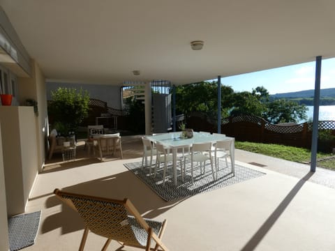 Private covered terrace overlooking the lake