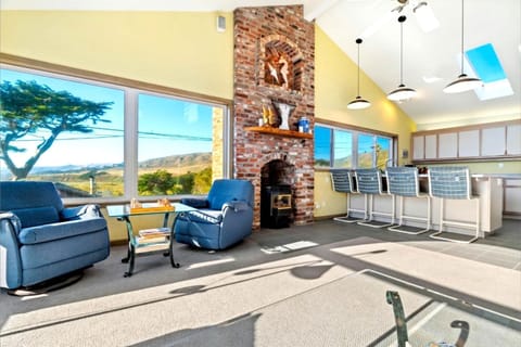 There's a cozy fireplace and views of the hills....