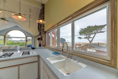 It's hard to wash dishes with a view like that, - daydreaming is easy here.