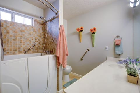 Shower, jetted tub, hair dryer, towels