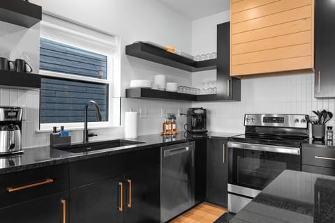 Fuel your day at the coffee bar, featuring a Philips LatteGo 3200 espresso machine and a selection of coffee supplies for your perfect cup, anytime.