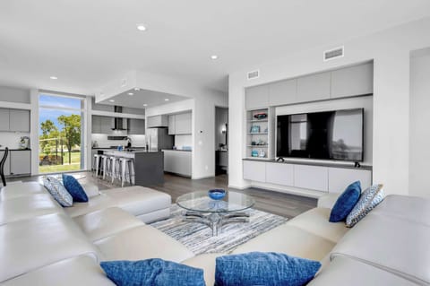Entryway half bathroom in between the living room and kitchen