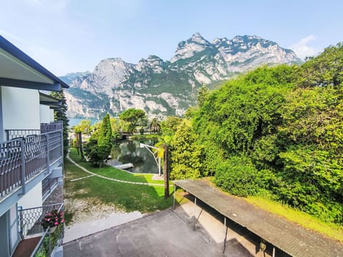 Sky, Property, Furniture, Table, Azure, Chair, Building, Window, Shade, Architecture