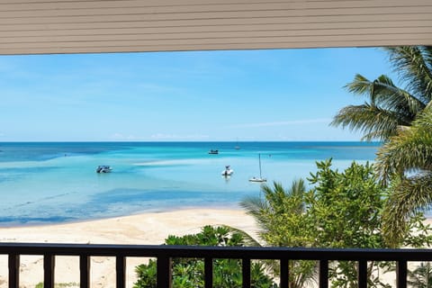 On the beach, sun loungers, beach towels