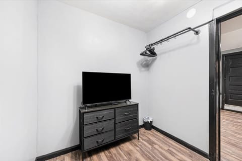 40 inch TV, dresser drawer, clothes rack