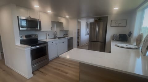 Fully stocked kitchen ready to use during family dinners. Kids dishes provided