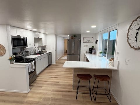 High end appliances & open concept kitchen makes this space feel like home