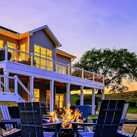 Cozy fire pit on a beautifully lit patio, perfect for evening gatherings and relaxation
