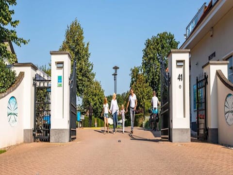Sky, Building, Plant, Window, Tree, Road Surface, Asphalt, Residential Area, Urban Design, Facade