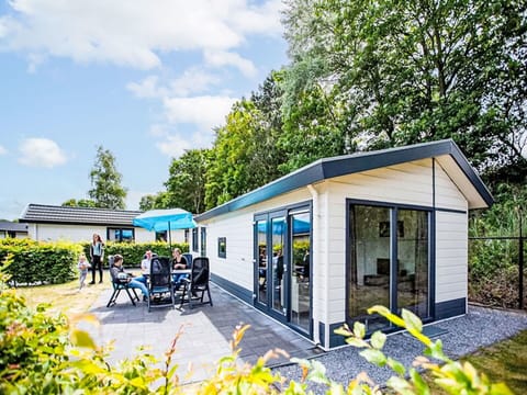 Plant, Sky, Property, Cloud, Shade, Tree, Yellow, Building, Grass, Leisure