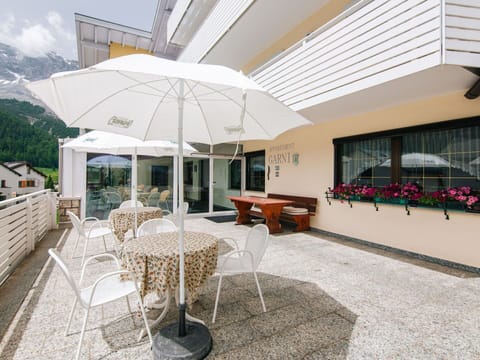 Property, Furniture, Building, Table, Plant, Flowerpot, Chair, Shade, Lighting, Outdoor Furniture