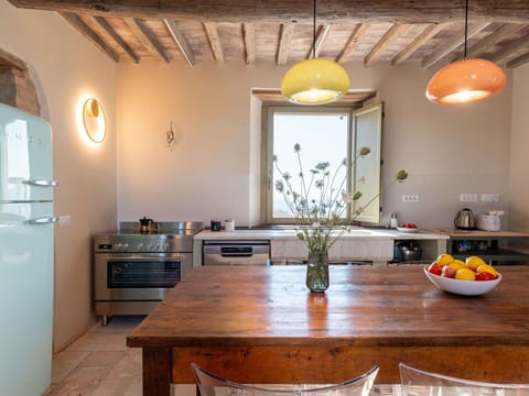 Table, Property, Furniture, Plant, Cabinetry, Wood, Tableware, Lighting, Interior Design, Kitchen