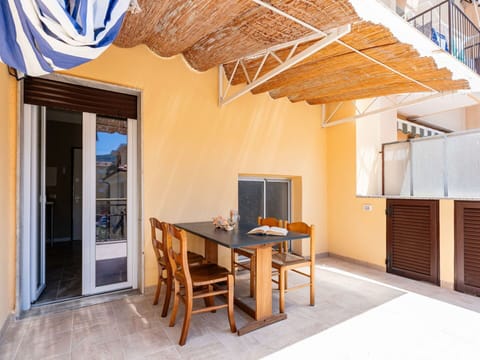 Sky, Property, Furniture, Table, Azure, Chair, Building, Window, Shade, Architecture