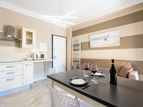 Sky, Property, Furniture, Table, Azure, Chair, Building, Window, Shade, Architecture