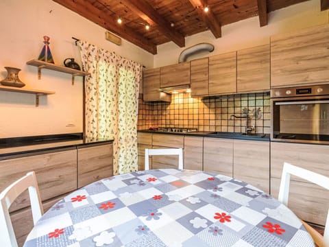 Sky, Property, Furniture, Table, Azure, Chair, Building, Window, Shade, Architecture