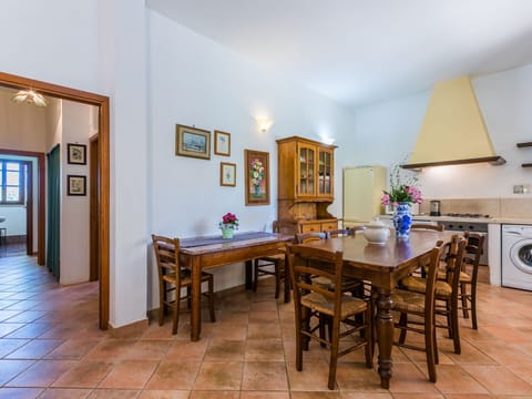 Sky, Property, Furniture, Table, Azure, Chair, Building, Window, Shade, Architecture