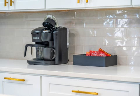 Your morning coffee routine just got an upgrade! Enjoy a fresh brew from the coffee bar, conveniently located in the kitchen.