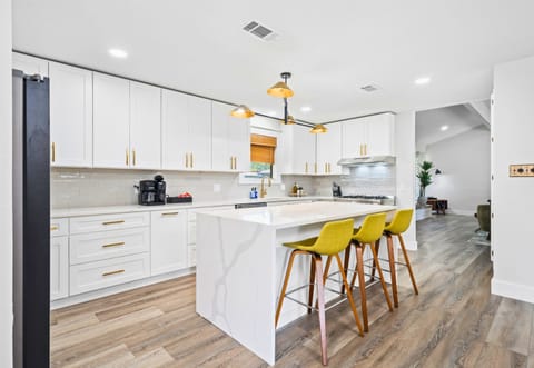Another angle of the kitchen reveals even more prep space and storage. You’ll find everything you need right at your fingertips.