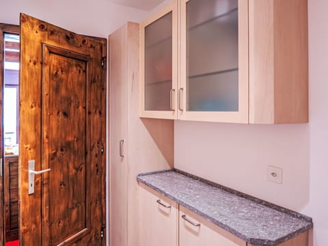 Cabinetry, Property, Furniture, Countertop, Wood, Interior Design, Wood Stain, Wall, Floor, Kitchen