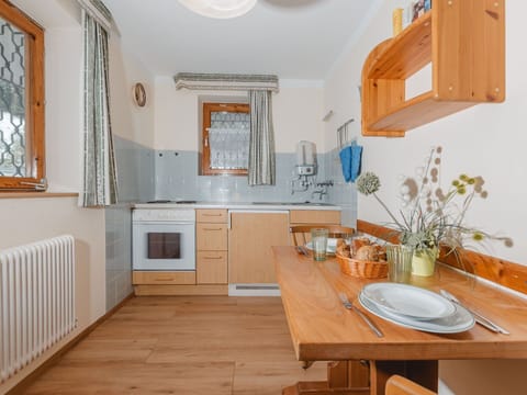 Furniture, Cabinetry, Countertop, Property, Table, Kitchen, Wood, Azure, Window, Plant