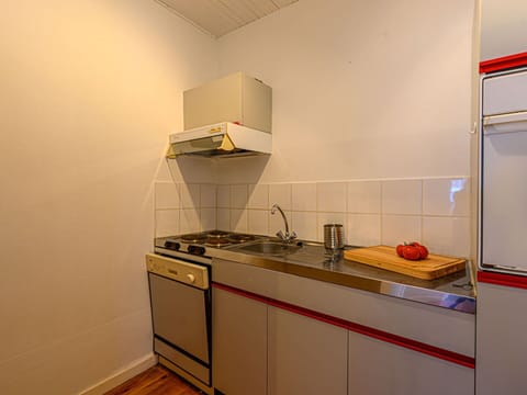 Cabinetry, Building, Countertop, Kitchen, Kitchen Stove, Kitchen Appliance, Wood, Cooktop, Interior Design, House