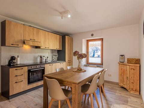 Cabinetry, Property, Furniture, Countertop, Wood, Table, Interior Design, Lighting, Floor, Flooring