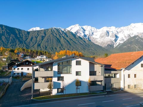 Sky, Mountain, Building, Window, World, Azure, Snow, House, Plant, Natural Landscape