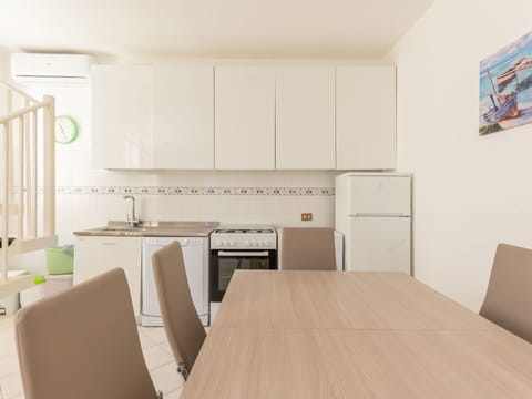 Cabinetry, Table, Furniture, Countertop, Chair, Wood, Kitchen, Kitchen Stove, Flooring