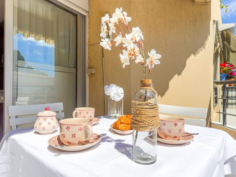 Food, Tableware, Table, Flower, Furniture, Tablecloth, Decoration, Orange, Textile, Plate