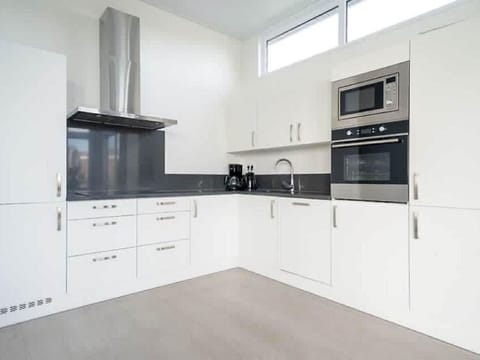 Countertop, Cabinetry, Property, Kitchen, Kitchen Appliance, Kitchen Stove, Home Appliance, Kitchen Sink, Sink, Interior Design