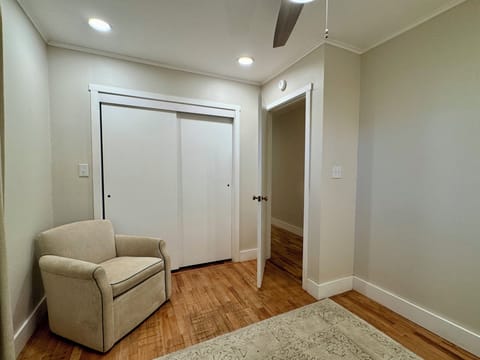 Swivel chair for lounging in the twin bedroom.